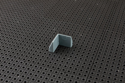 Support d'angle pour grille à outils