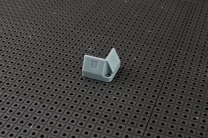 Support d'angle pour grille à outils