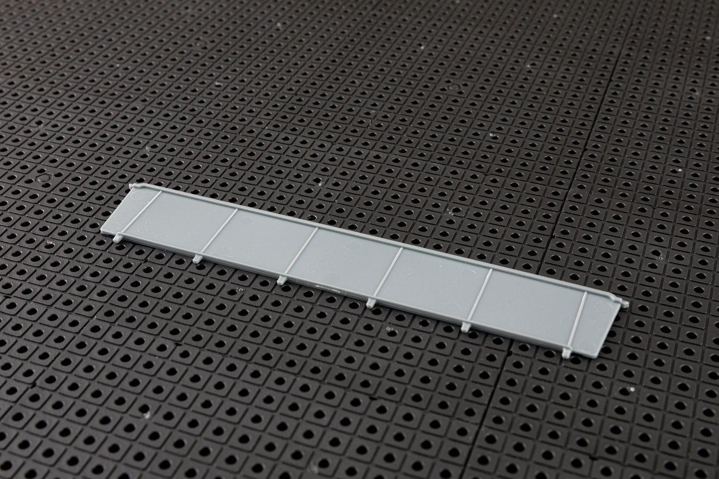 Grille d'outils, séparateur de conteneurs