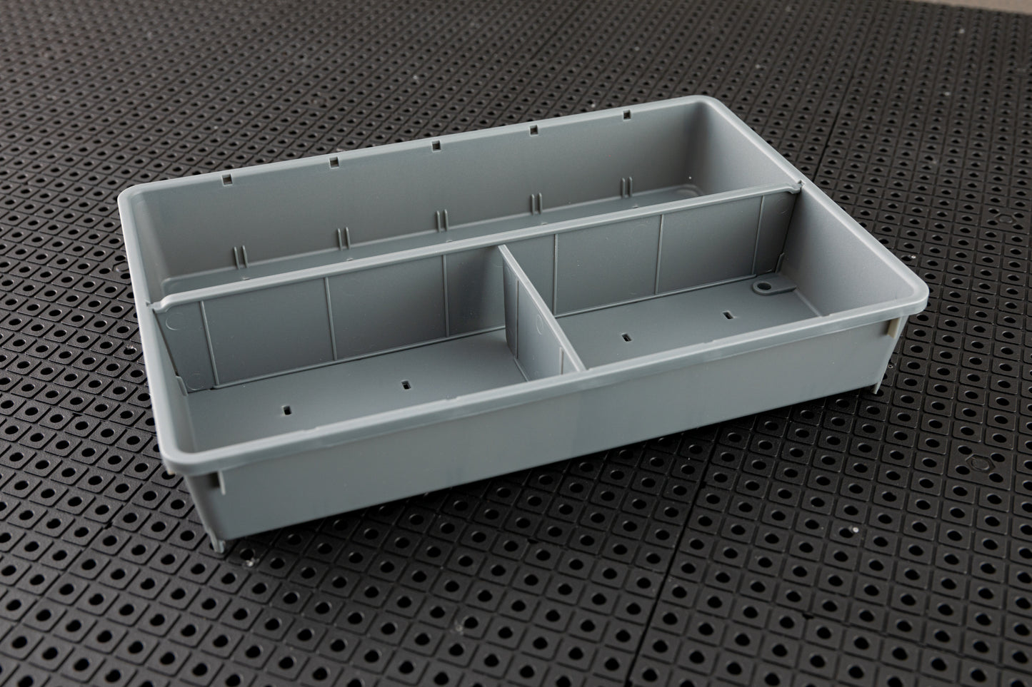 Grille d'outils, séparateur de conteneurs