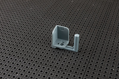 Support universel pour grille à outils