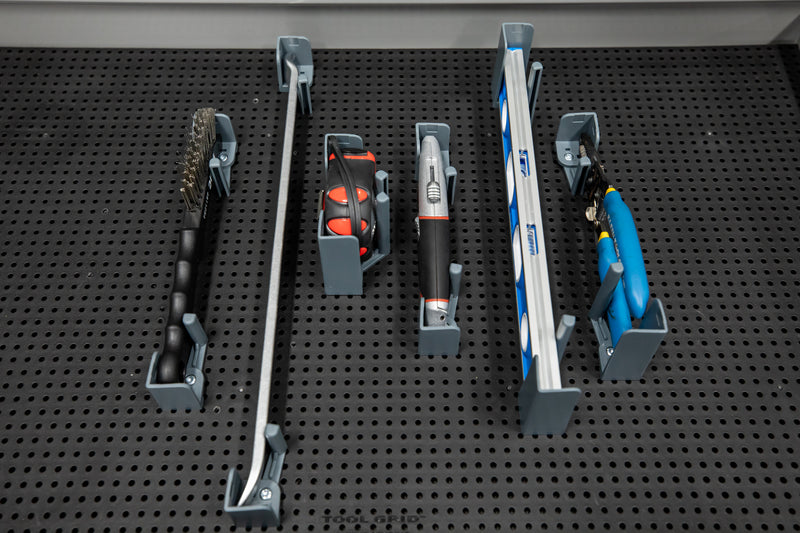 Support universel pour grille à outils