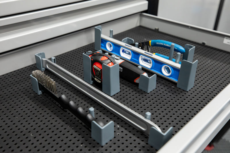 Support universel pour grille à outils