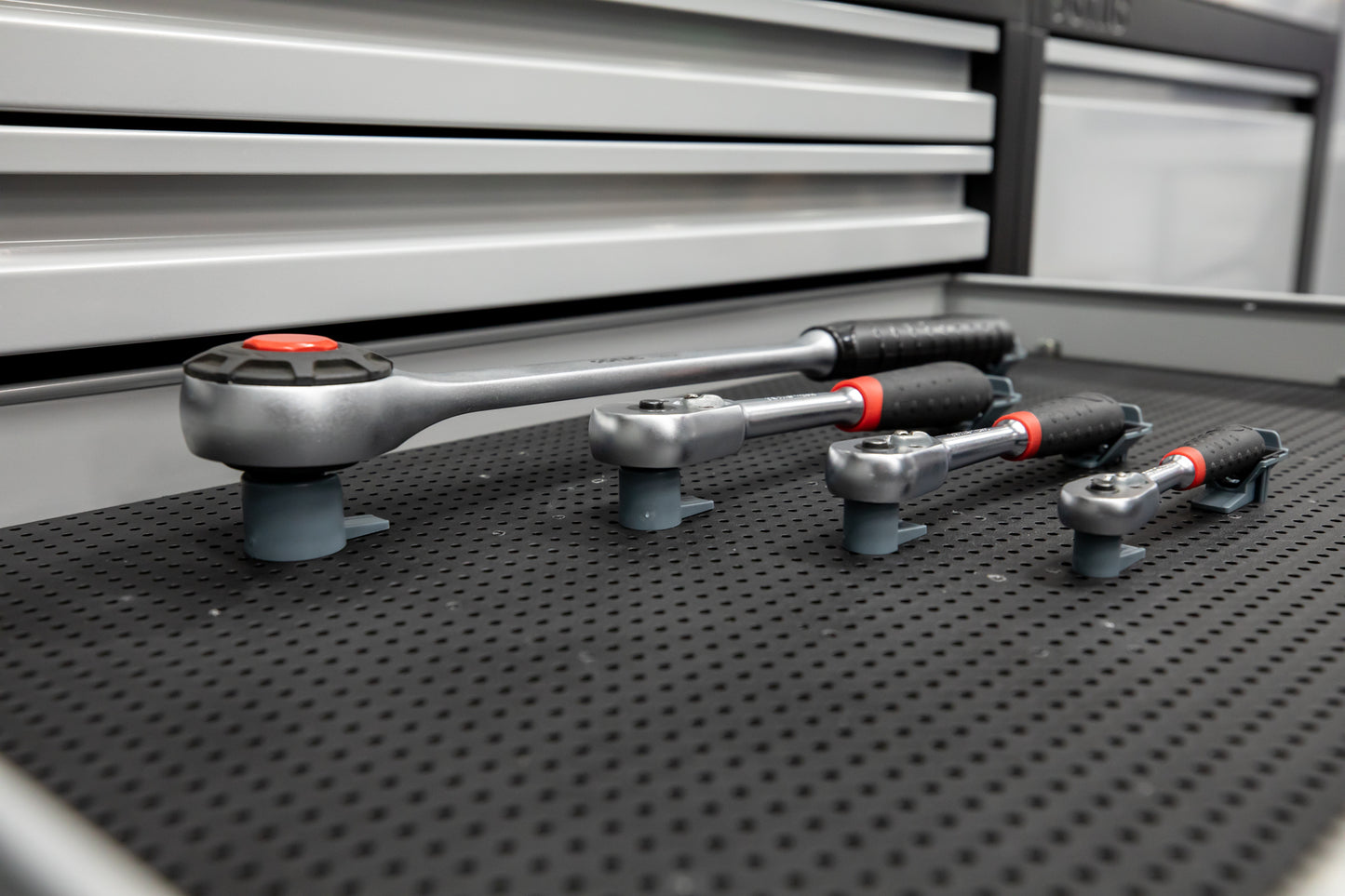 Porte-tête à cliquet pour grille d'outils